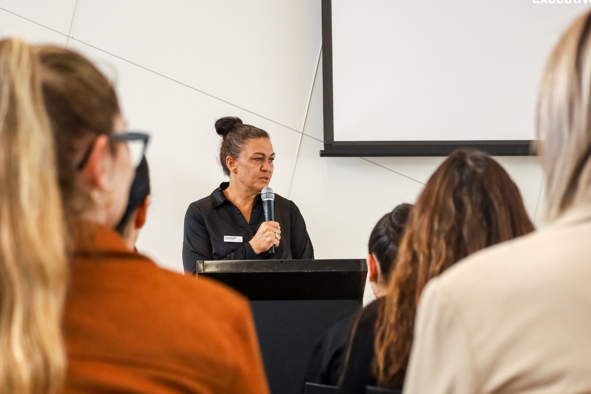 Helen Ockerby speaking at 2025 Alumni Graduation