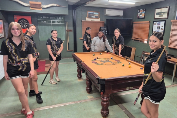 Hedland Shooting Stars participants playing pool on Day 1 of the camp at Newman Army Reserve Training Depot